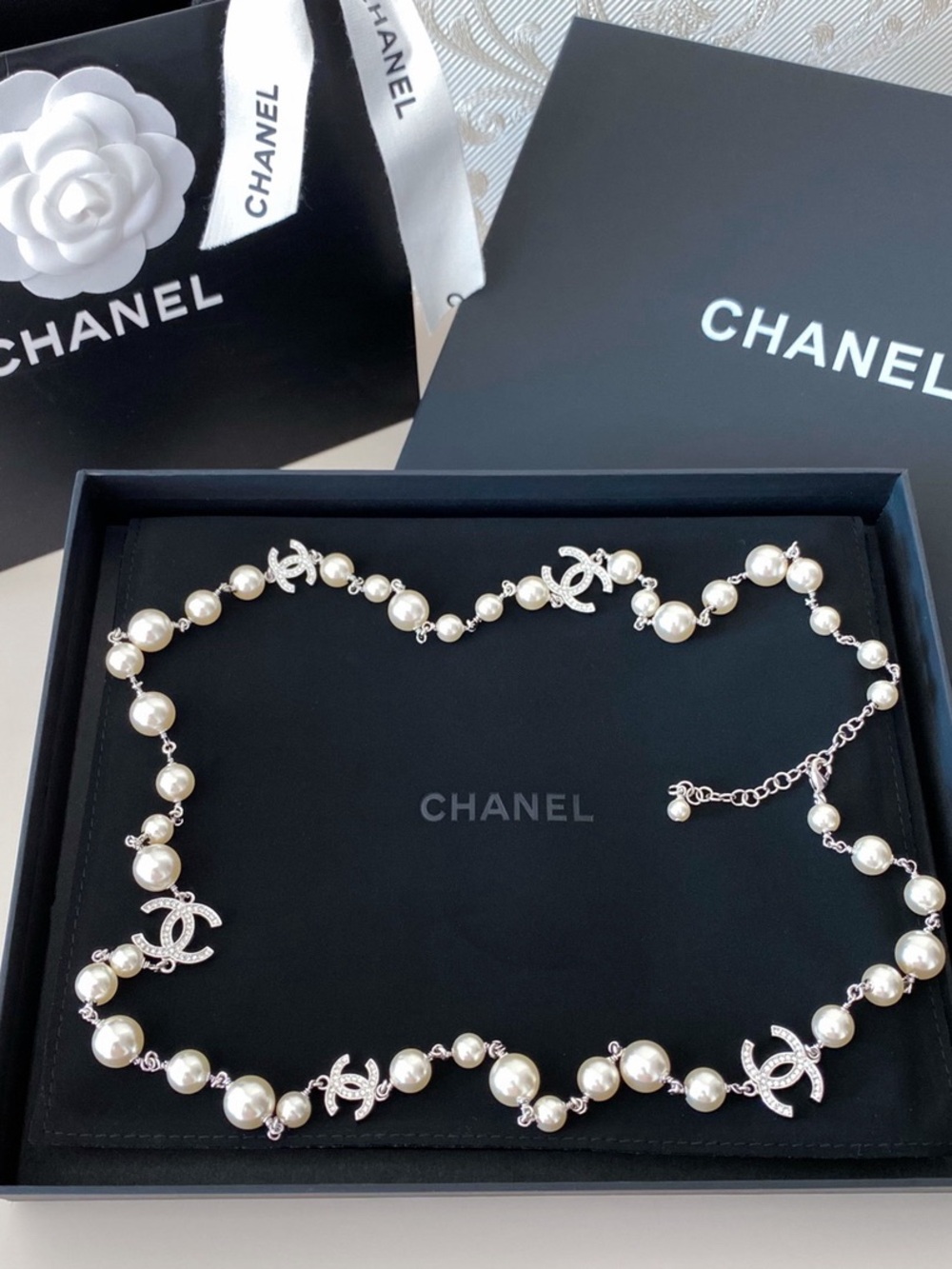 CHANEL Pearl Station Necklace with Silver CC Logos - White Pearls